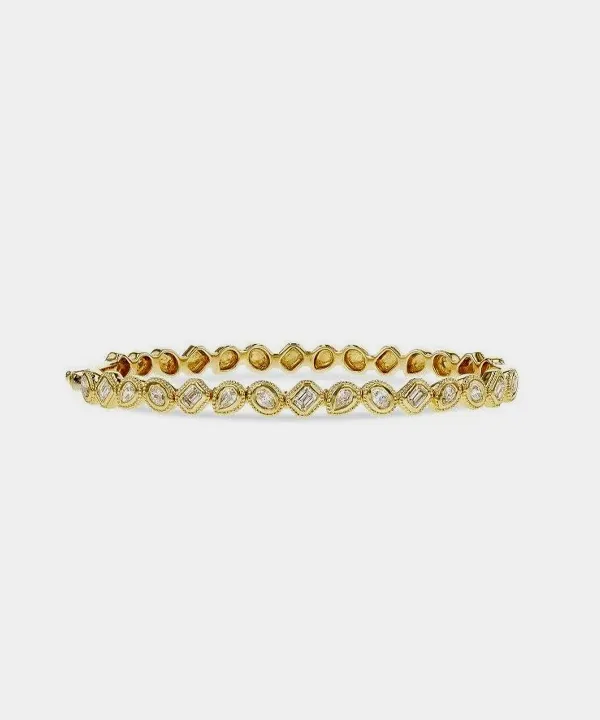 Gold bracelet with diamond-like accents, perfect for elegant occasions.