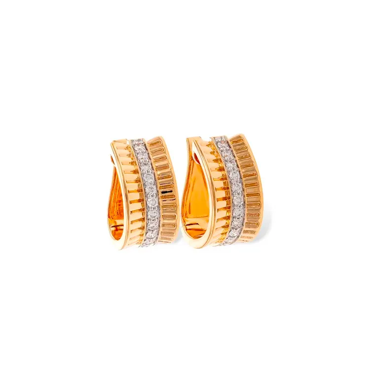 Gold earrings with diamond accents, featuring a wavy design.