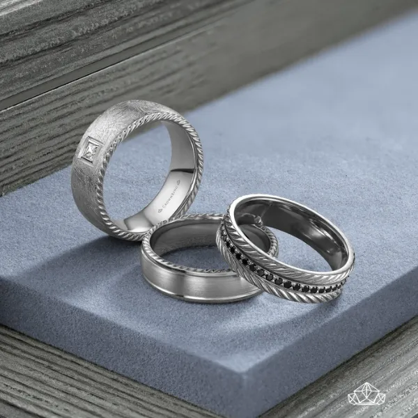 Crown Ring men's wedding bands with rope-twisted detail, brushed finishes, and diamond accent styles in platinum and white gold