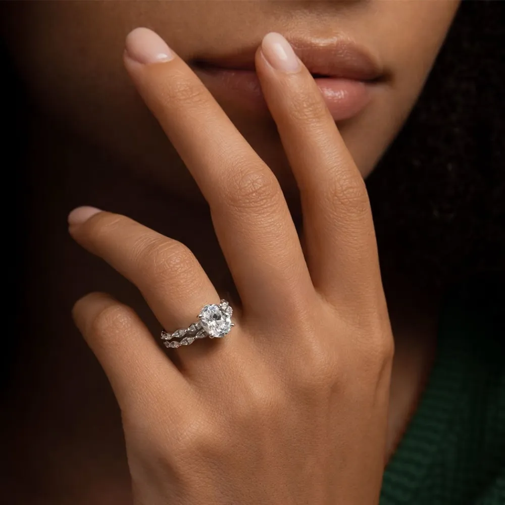 Oval diamond engagement ring with matching marquise diamond band by A.JAFFE — SVS Fine Jewelry, Oceanside, Long Island