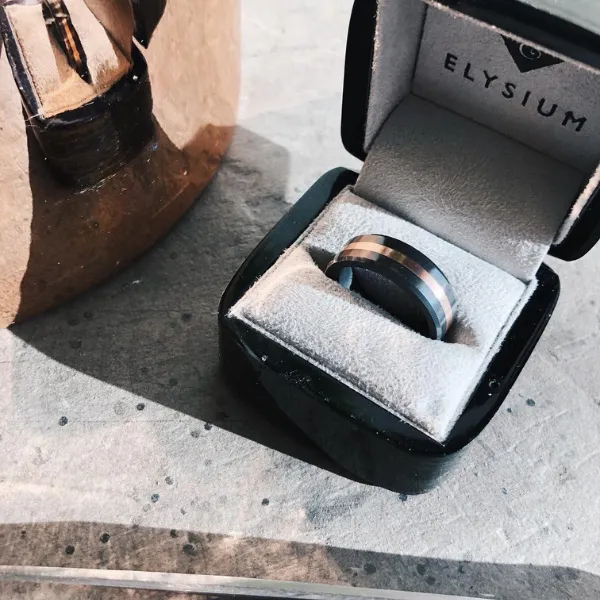 Elysium wedding band crafted from solid polycrystalline diamond with rose gold inlay — SVS Fine Jewelry, Long Island authorize