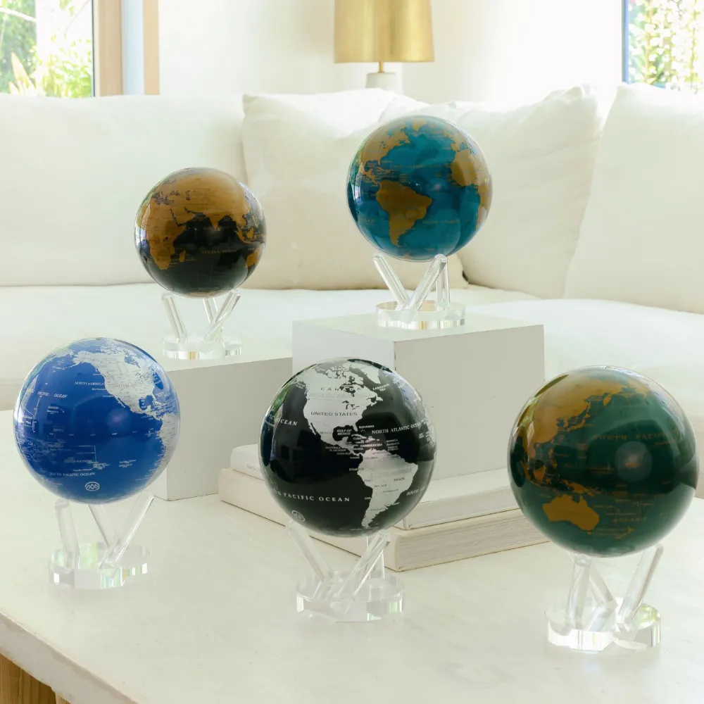 MOVA self-rotating globe powered by ambient light — desk, shelf, and home-office statement piece available at SVS Fine Jewelry Oceanside Long Island