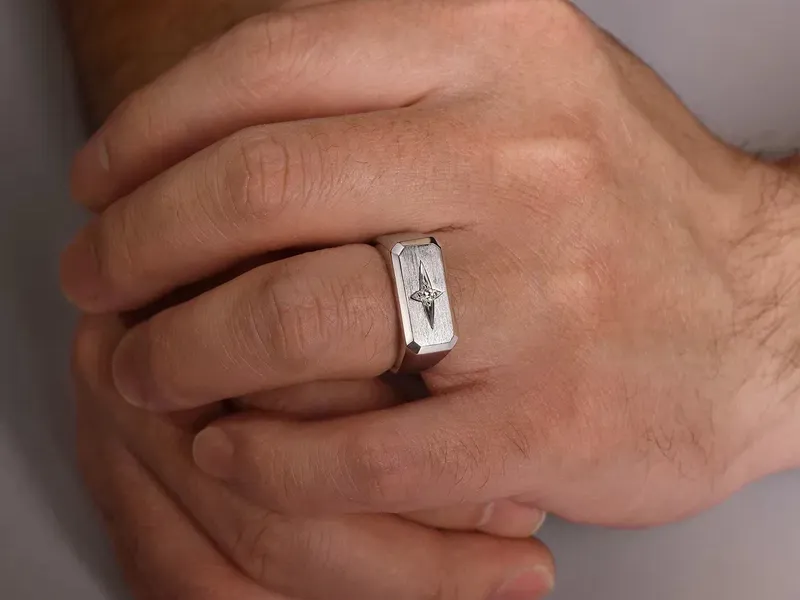 Men's signet ring on hand — sterling silver, gold, and engravable fashion rings at SVS Fine Jewelry, Oceanside NY