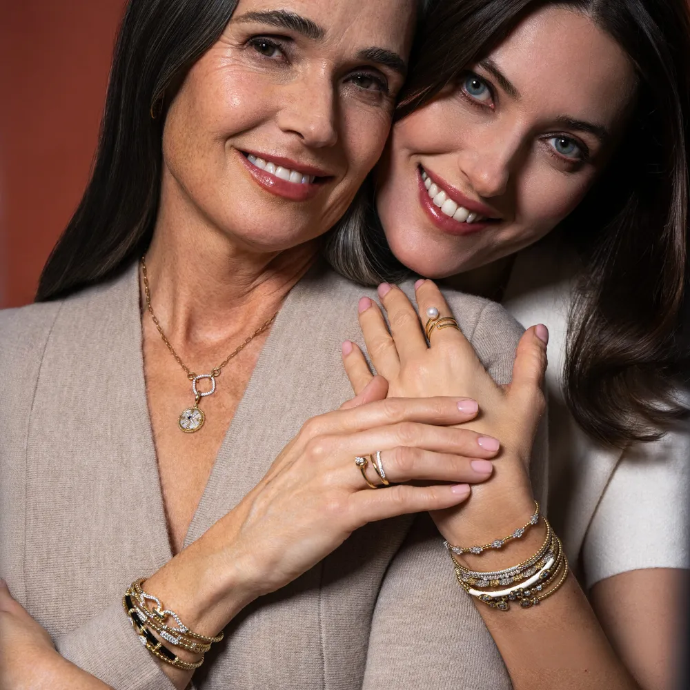 Mother and adult daughter wearing Gabriel & Co. fine jewelry at SVS Fine Jewelry Oceanside Long Island
