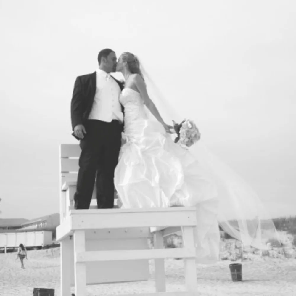 Sami V. Saatchi and Morgan Nicki Saatchi on their wedding day, July 13, 2007, Westhampton Beach Long Island &mdash; founders of SVS Fine Jewelry