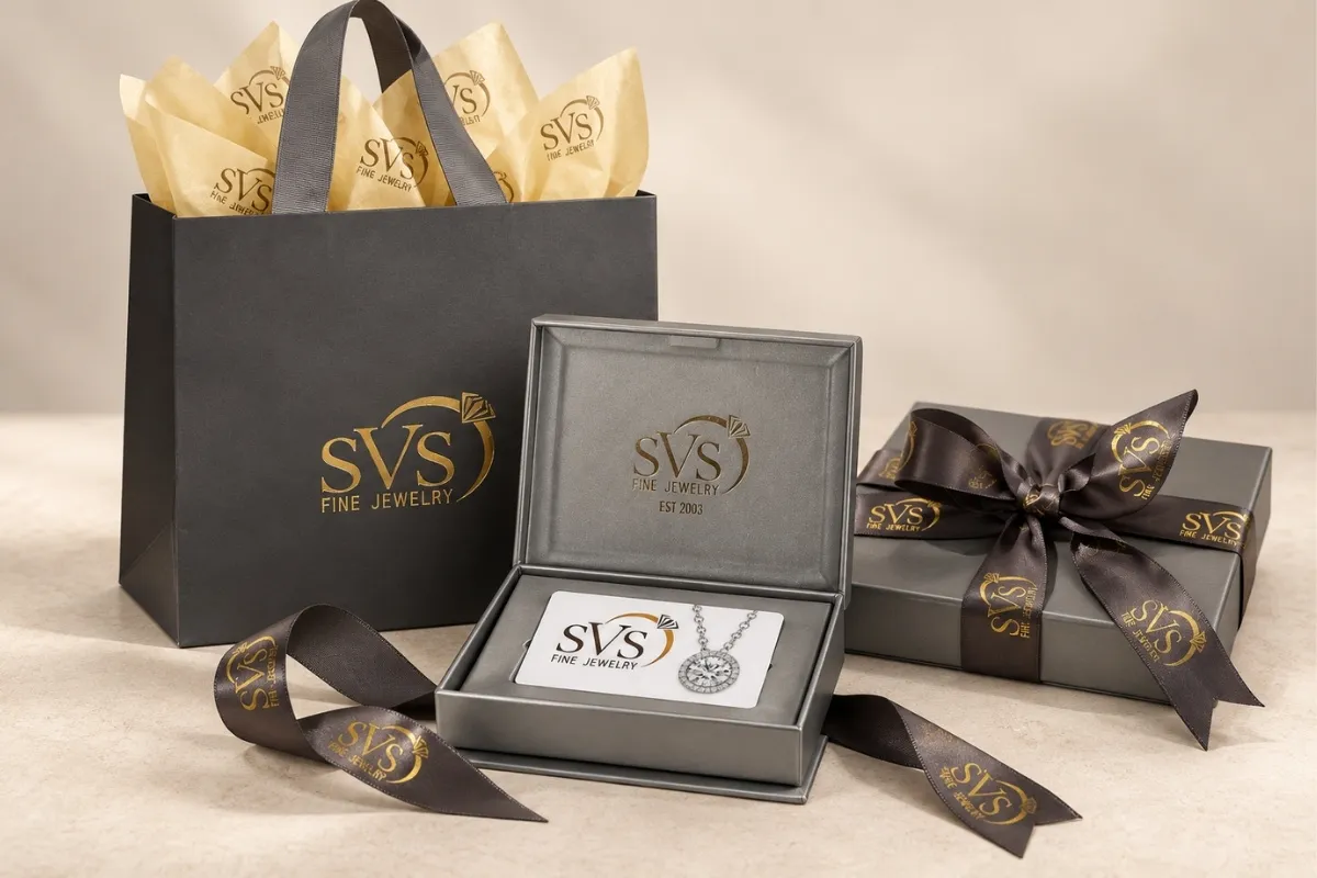 SVS Fine Jewelry gift presentation - signature grey box with gold-foil ribbon, gift bag, wrapped box and gift card