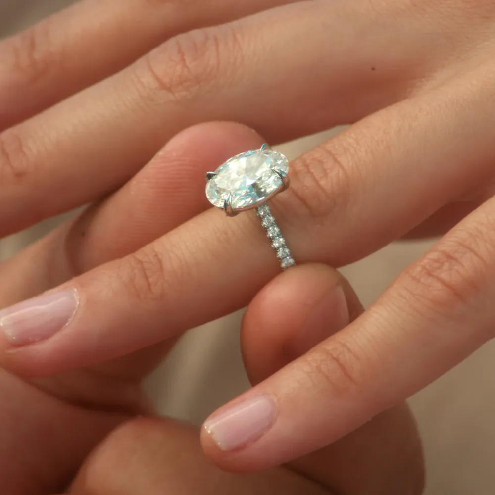 Large oval natural diamond solitaire engagement ring with pav&eacute; diamond band, eligible for the SVS Lifetime Diamond Upgrade Program at SVS Fine Jewelry Oceanside Long Island