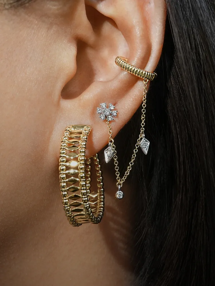 Diamond earrings and gold earrings at SVS Fine Jewelry — jewelry store Long Island NY