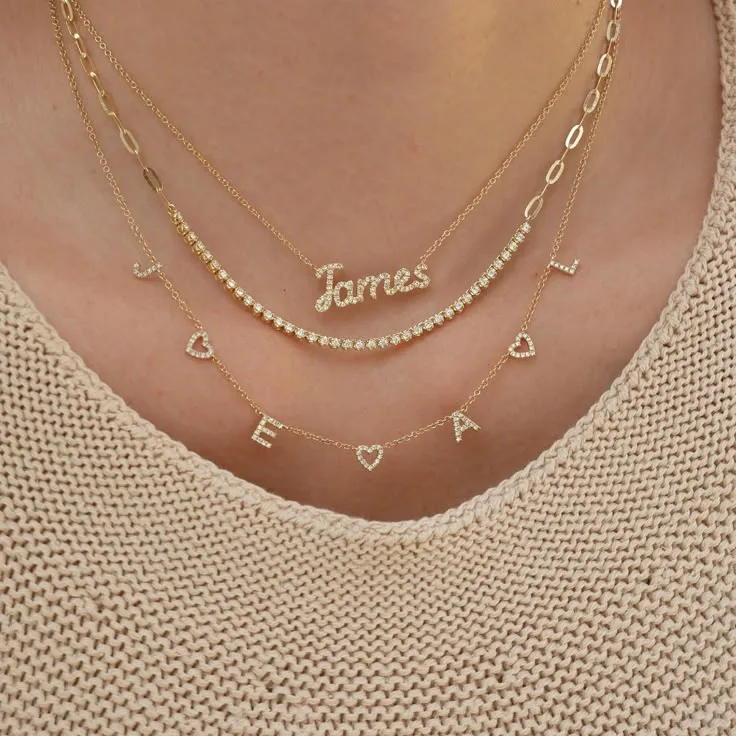 A jeweler adjusts a stunning purple gemstone ring with intricate diamond detailing.