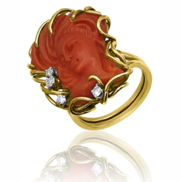 Carved Lady Coral, 14K Mid-Century Modern Ring Yellow 14K Mid-Century Modern free form-Fashion ring Size 6.5 With Carved Lady Coral And 0.10TW Round G/H SI Diamonds 8.3g. $999.00 Goldmart Jewelers Redding, CA