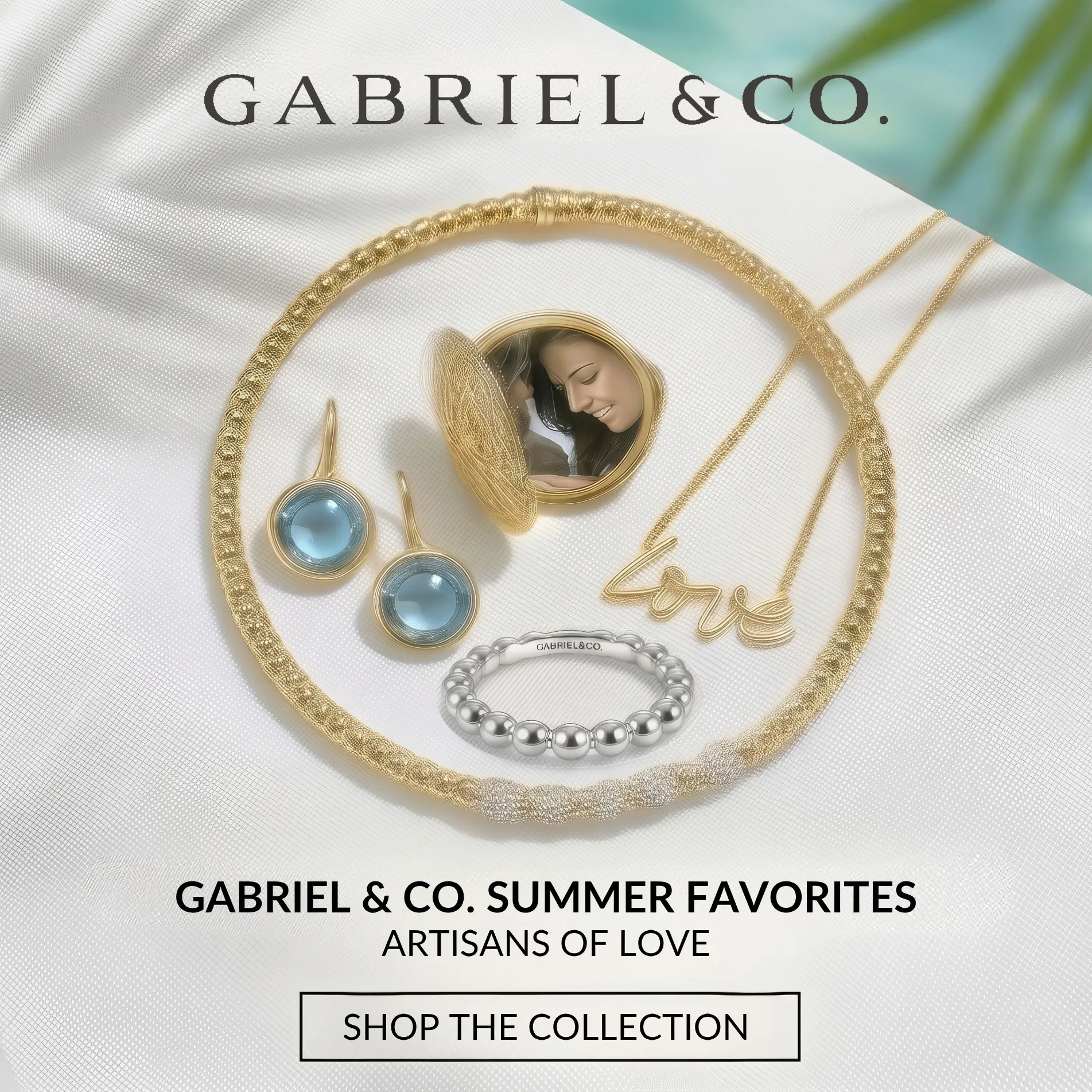 Woman admiring colorful gem jewelry with a cosmic background. Click to browse Goldmart Jewelers' gem collection!