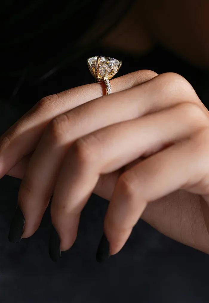 Stunning diamond engagement ring on a hand.