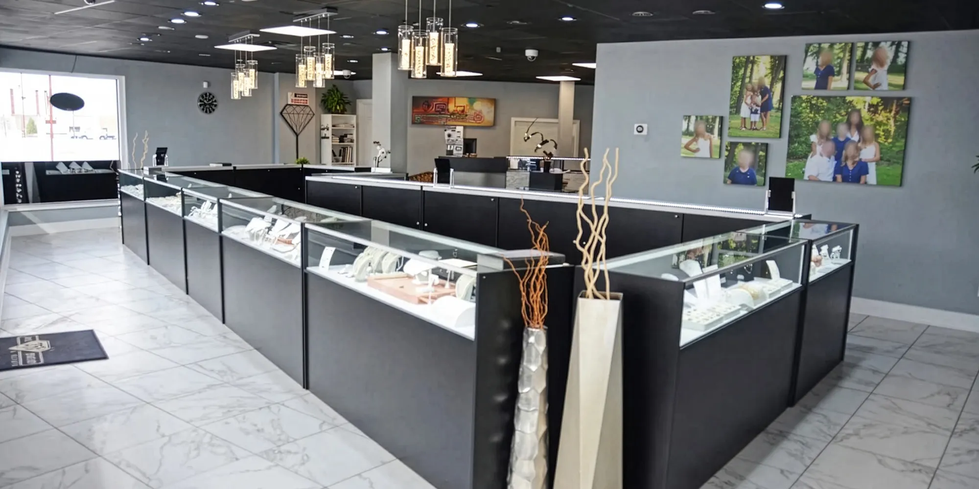 Interior of T.J.'s Fine Jewelry store in Carbondale, showcasing display cases and a modern design.