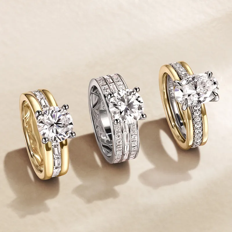 Three elegant engagement rings featuring sparkling diamonds, set in yellow and white gold.