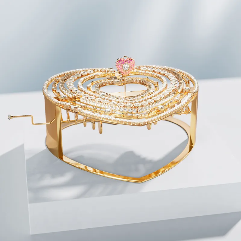 Gold heart-shaped jewelry piece adorned with crystals, featuring a pink flower accent. Click to explore Swarovski giftware.