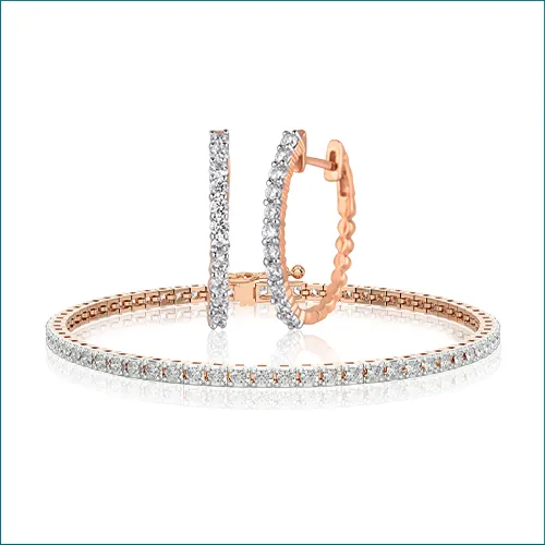CLASSIC CHIC A fusion of minimalism and fashion, these jewels in 9k-18k gold are enhanced with a profusion of diamonds. A wide c