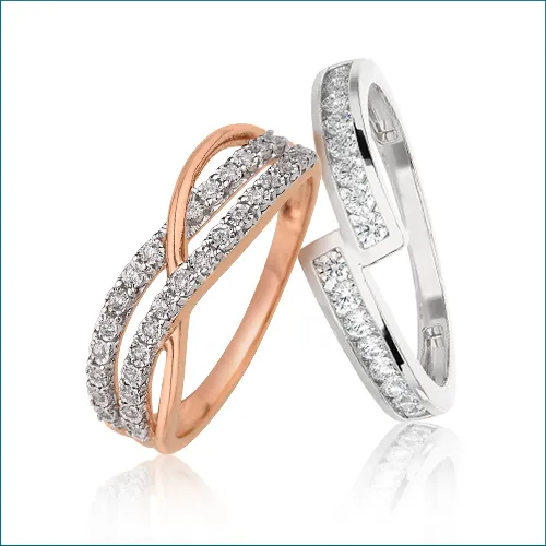 FASHION BANDS These stylish bands are crafted in 9k-18k white and pink gold, and studded with brilliant diamonds. Worn single or layered, they add panache to everyday attire. The Plumb Club CHARLOTTE, AL