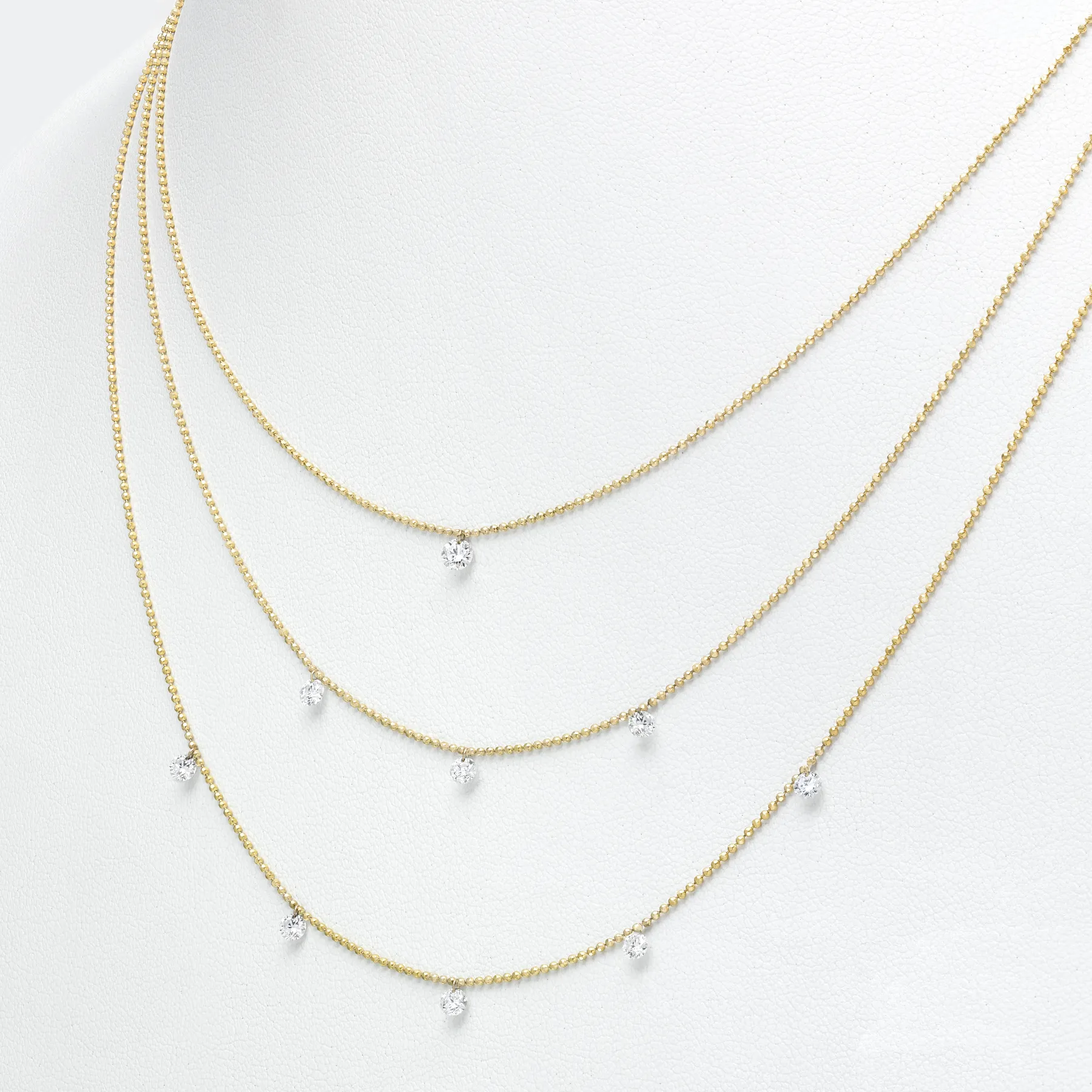 Dashing Diamonds Triple Necklace(P10077) This necklace's unique clasp system allows a woman to wear one, two, or all three layers at once -- and never tangle! It gives Brevani customers styling options and can be sold individually or as one complete piece! The Plumb Club CHARLOTTE, AL