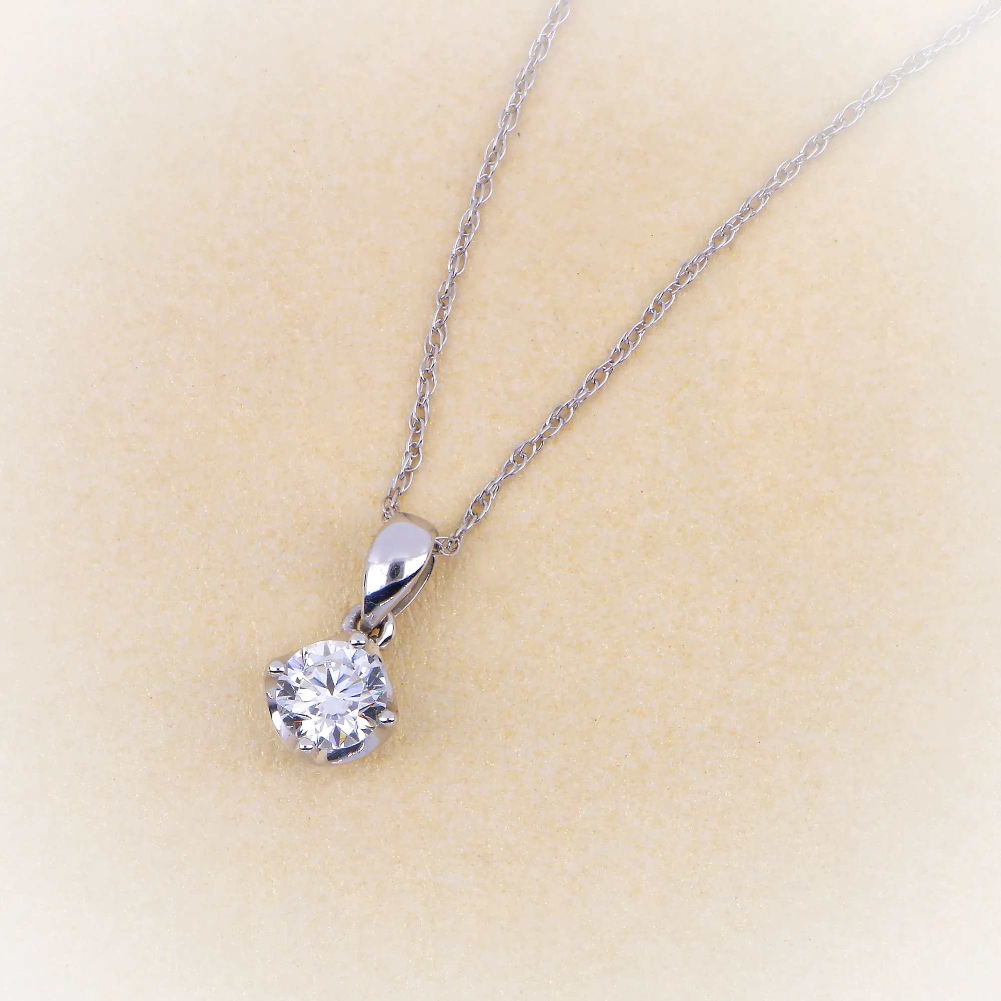 Solitaire Necklace Unmatched in beauty and elegance, this Solitaire Necklace is the stuff all sparkling dreams are made of The Plumb Club CHARLOTTE, AL