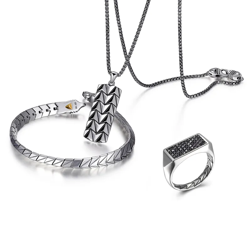 ETHOS Men’s Jewelry Bracelet, ring and pendant necklace feature textured arrow design in oxidized sterling silver. Ring showcases horizontal black spinel bar. The Plumb Club CHARLOTTE, AL