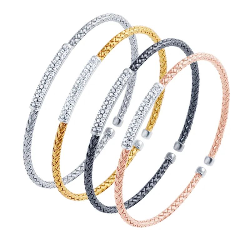 Charles Garnier Cuff Bracelets Beautiful everyday cuff bracelets with unique woven design. Fixed cubic zirconia pave setting, creating a functional two-tone appearance. The Plumb Club CHARLOTTE, AL