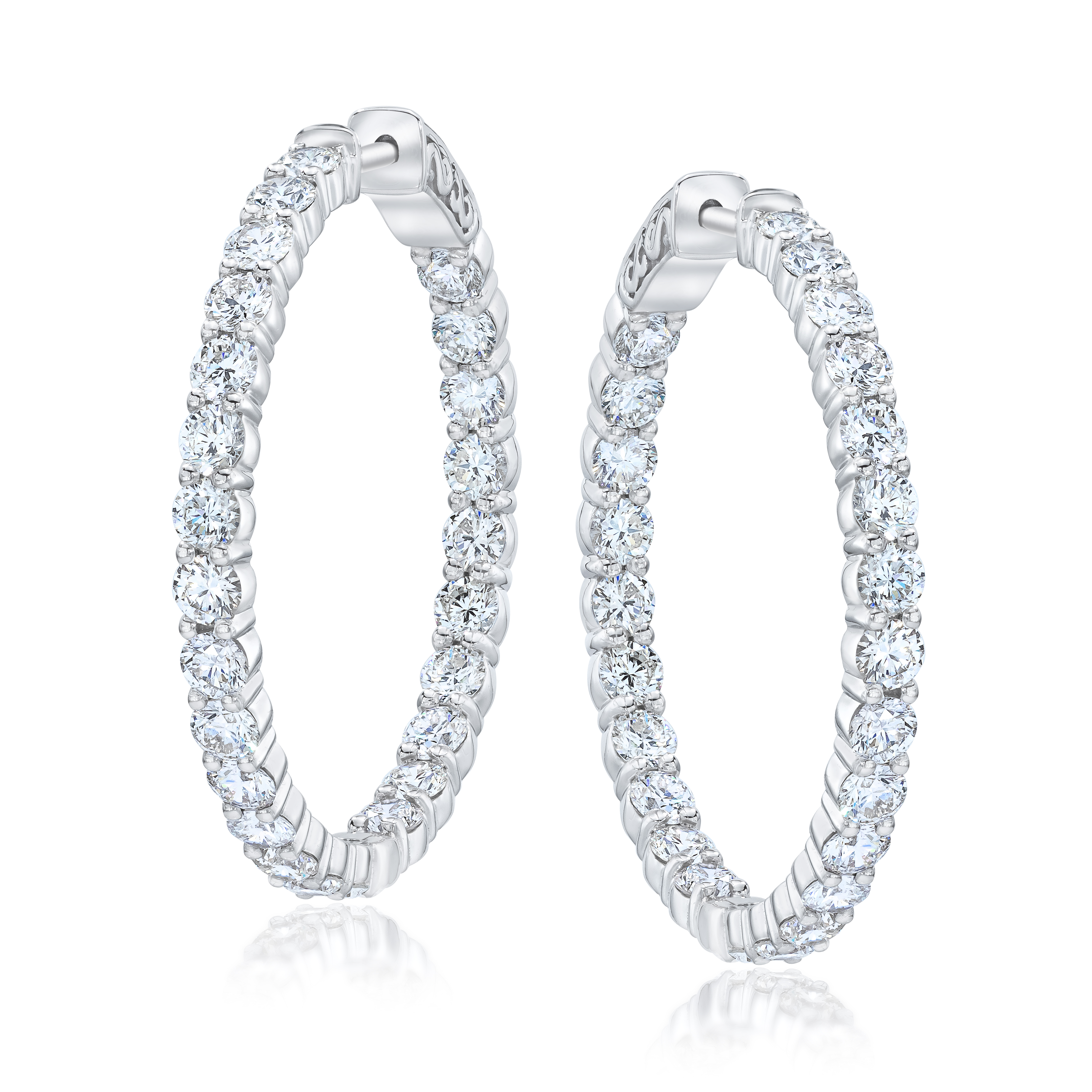 Diamond Hoop Earrings Classic diamond inside out hoop earrings in various total diamond weight sizes.  The Plumb Club CHARLOTTE, AL