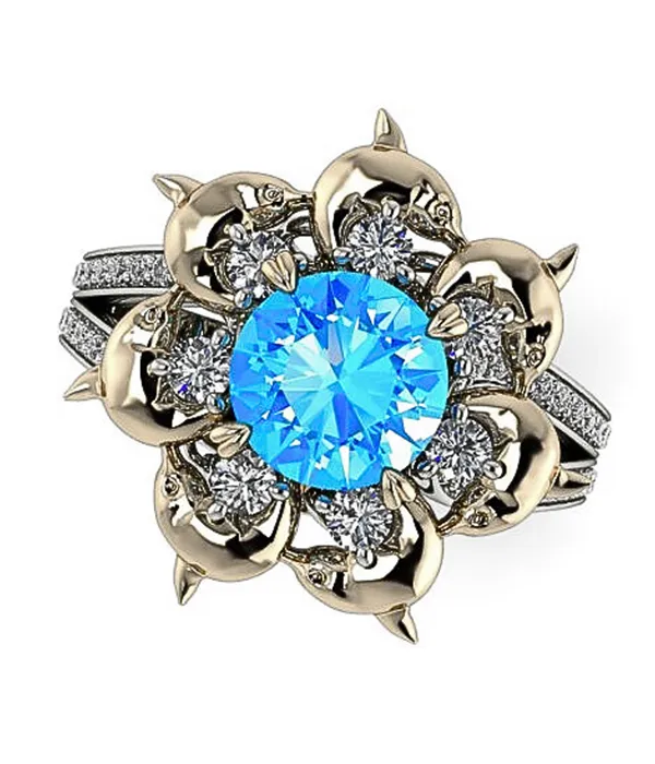 Dolphin-themed gemstone ring with a large blue center stone and diamond accents. Click to explore more gemstone rings.