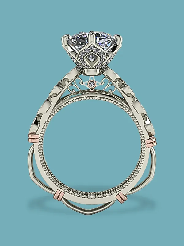 Elegant engagement ring with a large diamond centerpiece and intricate detailing, displayed on a turquoise background.