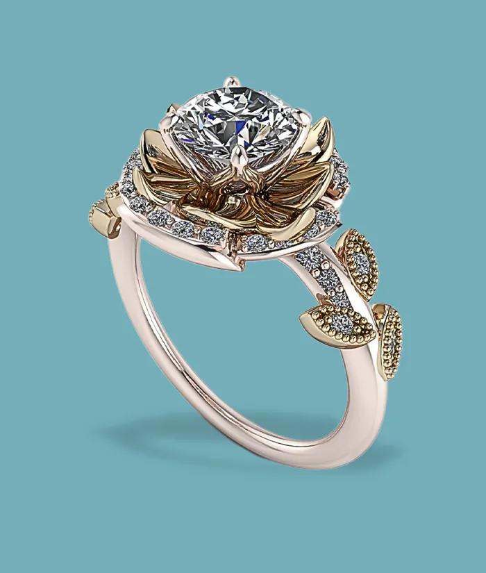 Elegant gold and diamond engagement ring with floral design. Visit Masterpiece Jewelers for fine jewelry in Daytona Beach.