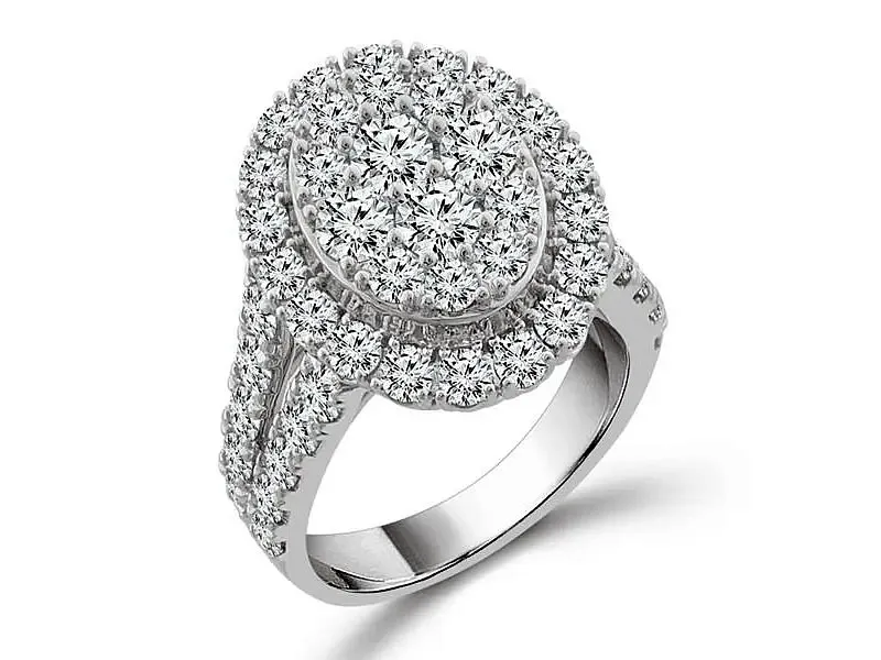 Lab Grown Diamond Engagement Ring $2495 Make a statement during our After Christmas Sale with this 14K white gold diamond ring, featuring 3 carats of round lab-grown diamonds in an oval cluster design with a split shank. With G&ndash;H color and SI1 clarity, it sparkles&mdash;regularly $3,495, now $2,495.  Van Adams Jewelers Snellville, GA