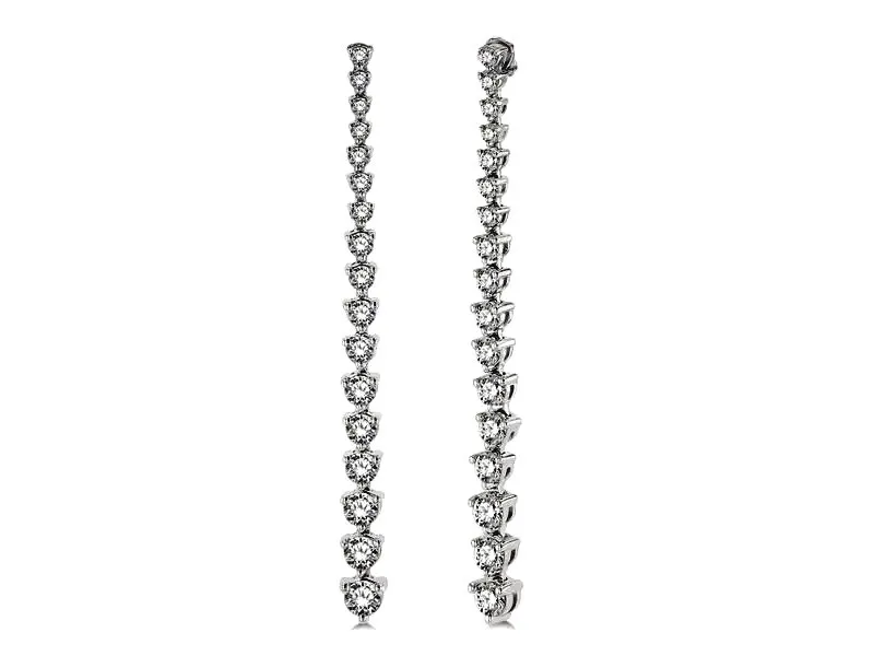 Riviera Diamond Earrings $2495 Regularly $3,495, now on sale for $2,495, these elegant 14K white gold Riviera drop earrings feature a rhodium finish and 34 prong-set round diamonds totaling 1&frac12; ctw, arranged in an ascending design from smallest at the top to largest at the base. Van Adams Jewelers Snellville, GA