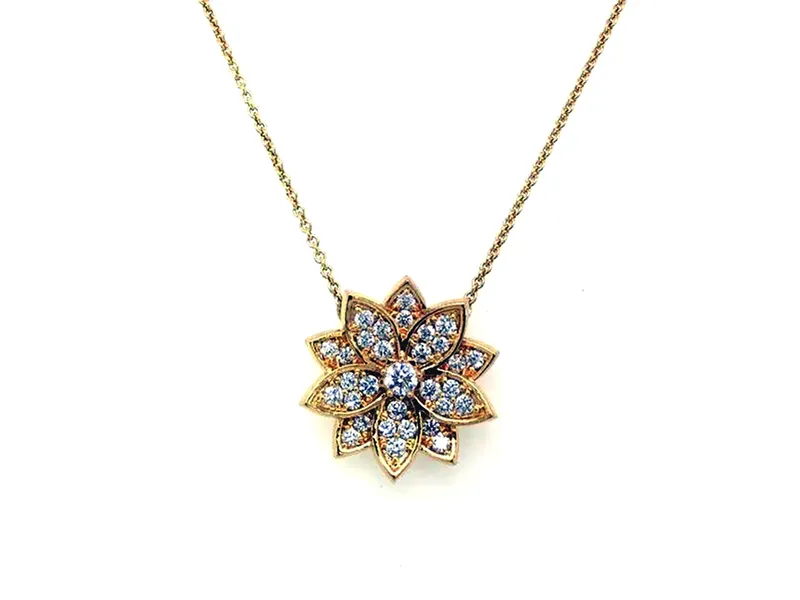 Diamond Flower Necklace $1995 Make a statement of timeless elegance with this 14K yellow gold diamond flower necklace, set with &frac12; carat of round diamonds&mdash;regularly $3,495, now on sale for $1,995 for a stunning savings on a truly radiant design. Hurry, this won't last. Van Adams Jewelers Snellville, GA