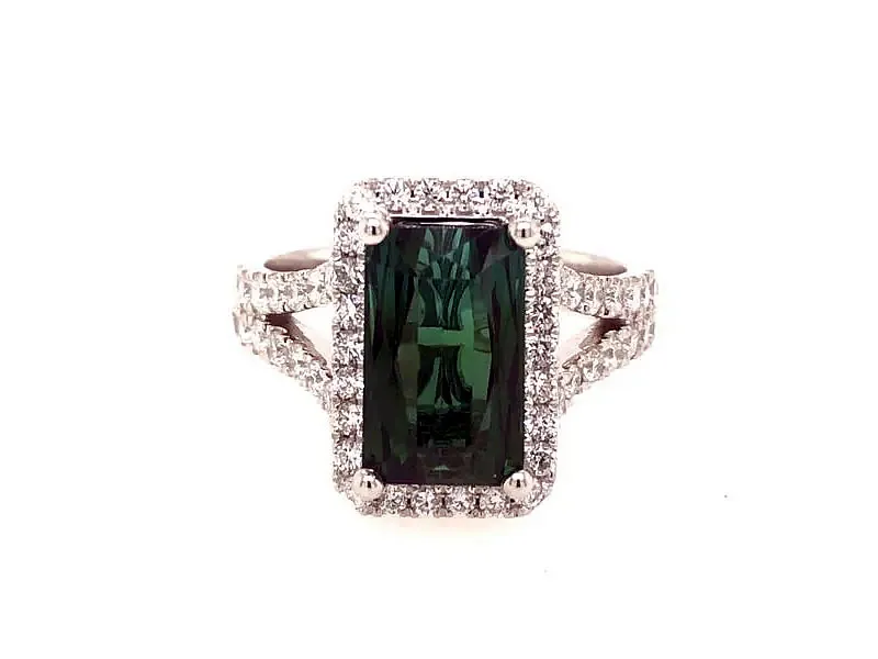 Tourmaline Ring $1995 Regularly $3,995, now on sale for $1,995, this stunning fashion ring showcases a 3.34 ct emerald-cut blue/green tourmaline with rich depth of color, beautifully framed by .80 carats of sparkling round diamonds for a total gem weight of over 4 carats. Van Adams Jewelers Snellville, GA