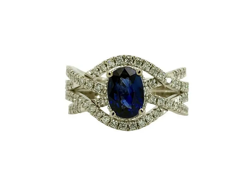 Sapphire and Diamond RIng $2995 Set in radiant 14K white gold, this elegant fashion ring showcases a 1 carat velvety blue oval sapphire surrounded by 1.20 carats of round sparkling diamonds, for a total gem weight of 2.22 carats&mdash;regularly $3,995, now $2,995. Van Adams Jewelers Snellville, GA