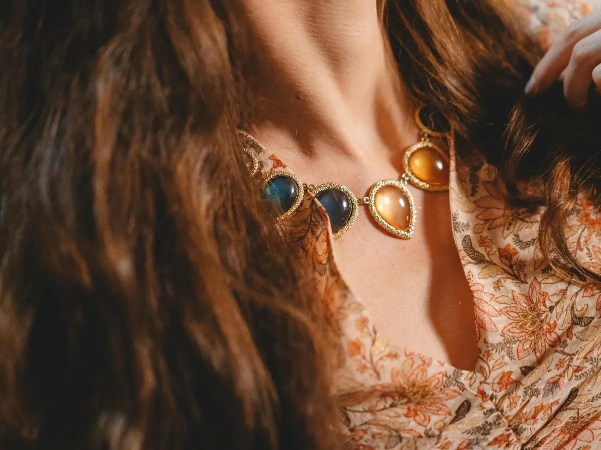 Vintage necklace with teardrop-shaped colorful gemstones.