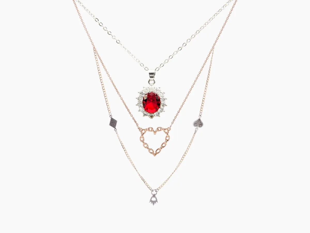 Red gemstone and heart charm necklaces.