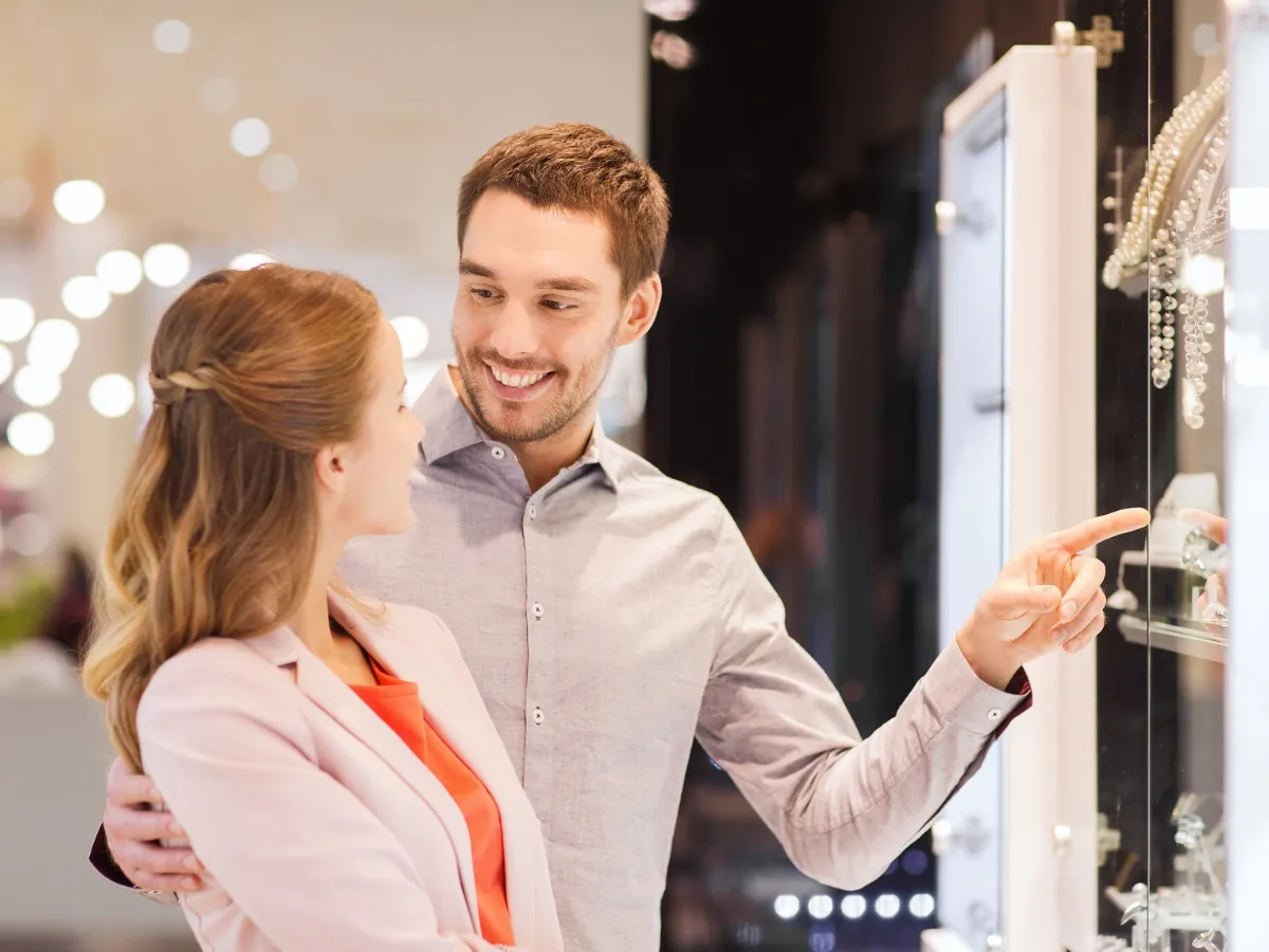 Couple shopping for jewelry display.