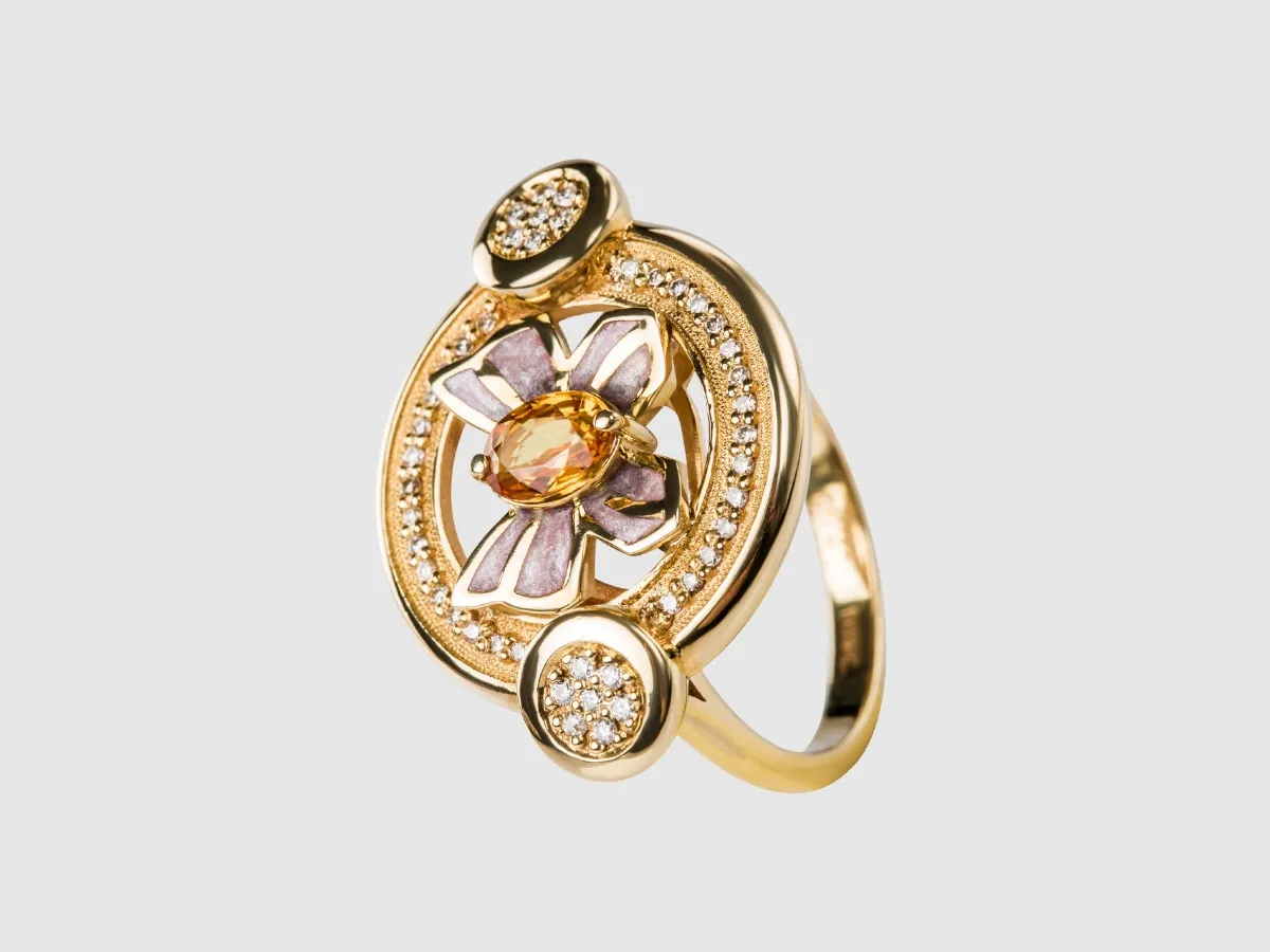 Ornate gold ring with gemstones.