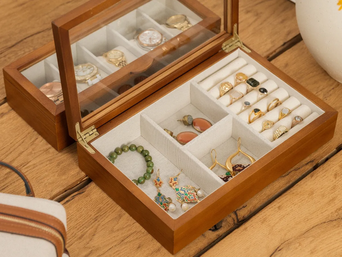 Wooden jewelry box with accessories.