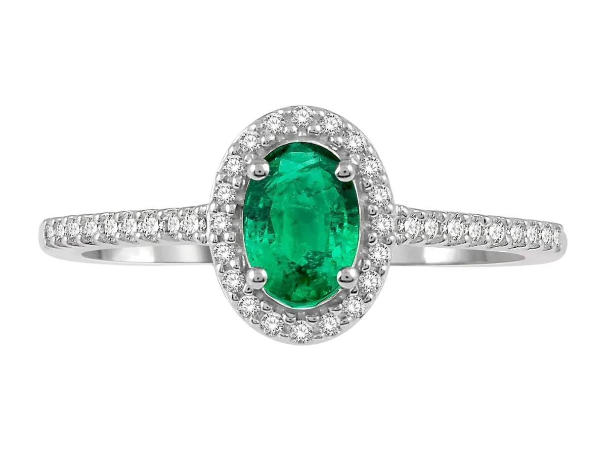 Oval emerald halo diamond ring.