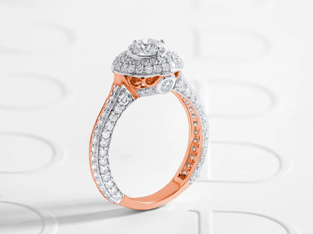 Rose gold halo engagement ring.