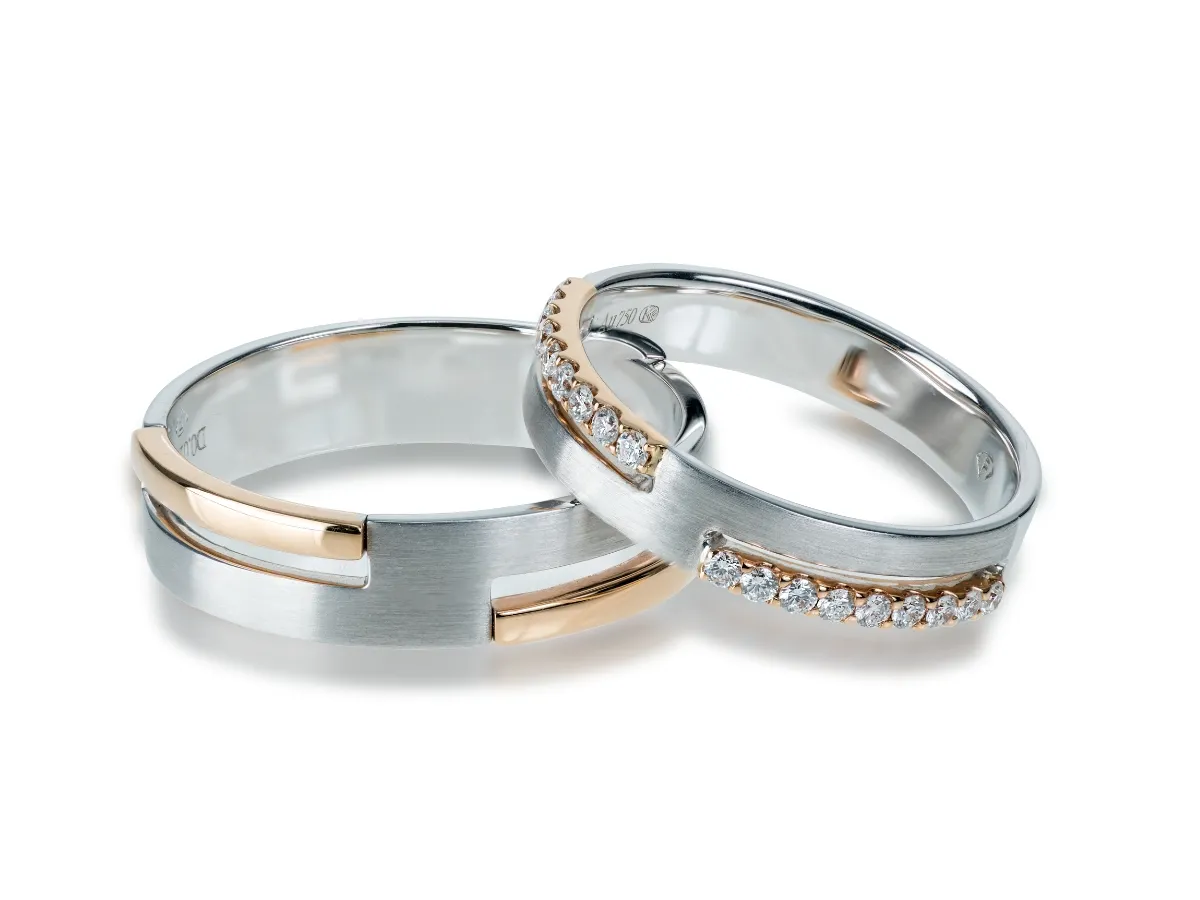 Two-tone wedding rings with diamonds.