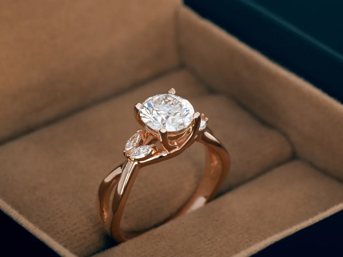 Rose gold ring with diamond.