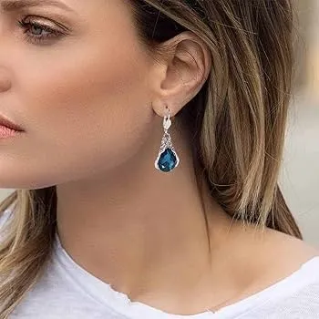 Colored Stone Earrings Our colored stone earrings bring vibrant elegance to every look, showcasing brilliant gems like sapphires