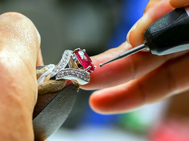 Jeweler working on a fashion ring at  Van Adams Jewelers Snellville, GA