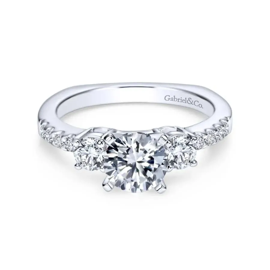 Three-Stone Engagement Rings Symbolizing the past, present, and future, three diamonds in a harmonious arrangement.​ Van Adams Jewelers Snellville, GA