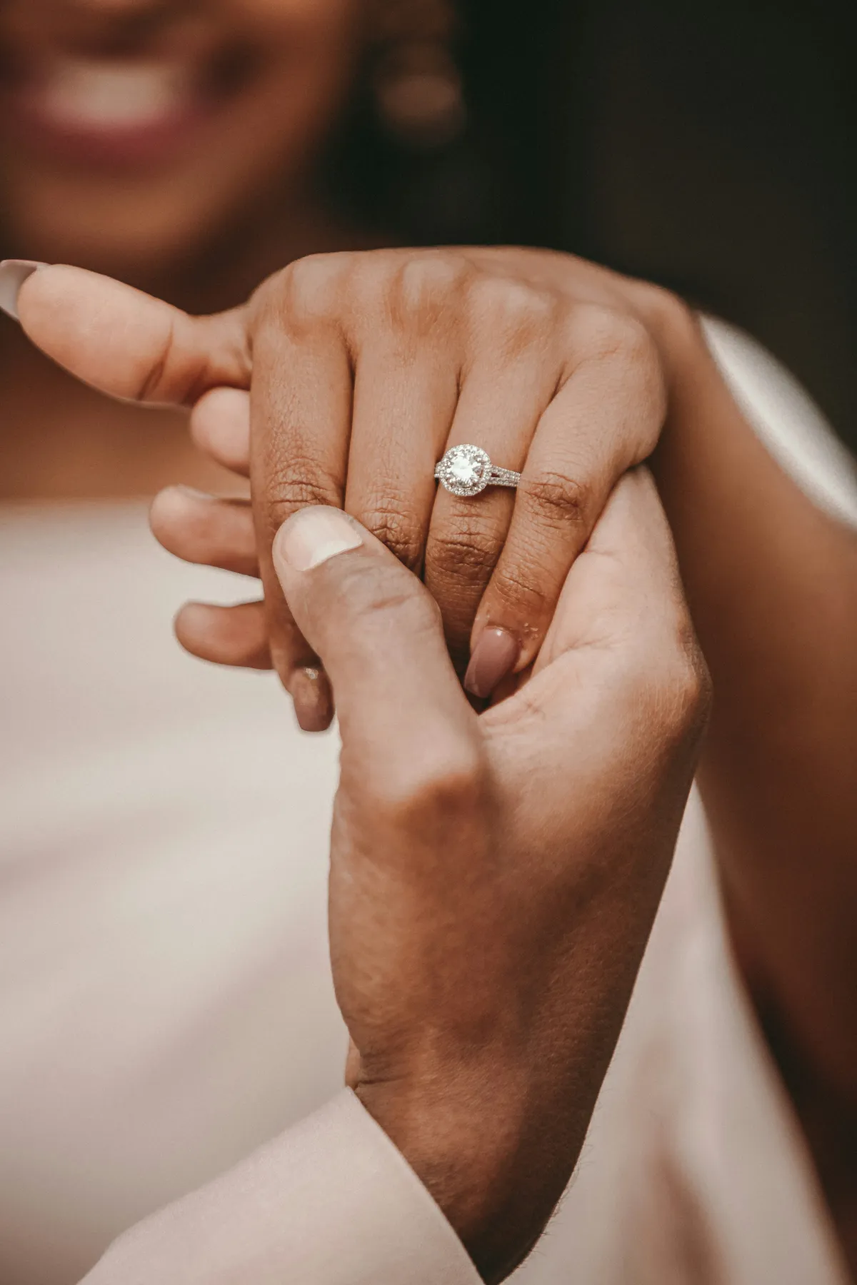 What hand does the engagement ring go on?