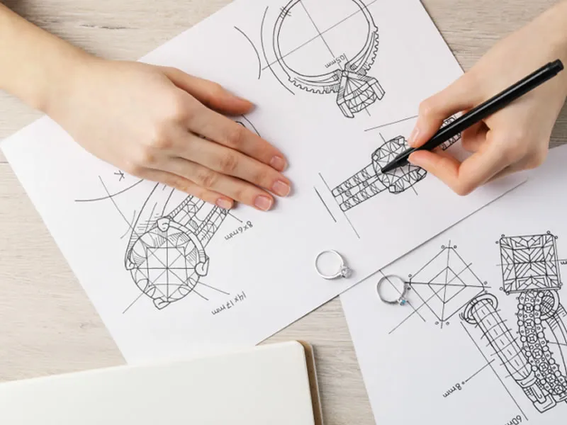 Van Adams helping a couple design a custom engagement ring in Gwinnett County 