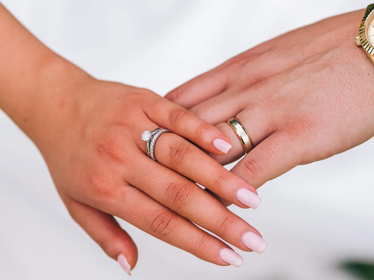 Diamond engagement ring and matching wedding band set.
