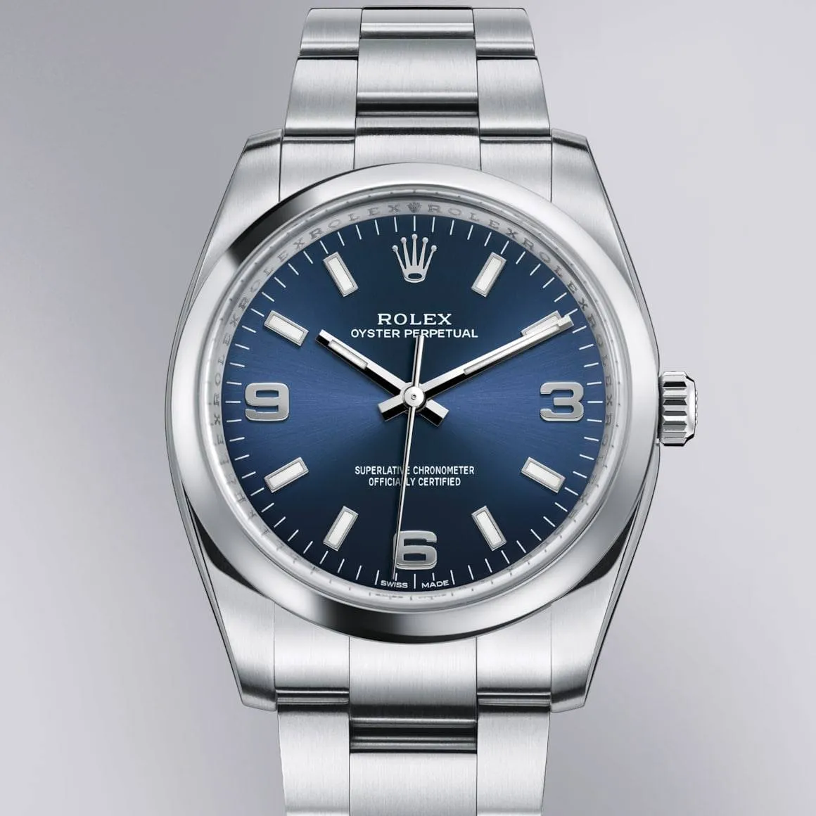 Rolex Oyster Perpetual, blue dial with 3-6-9 numerals | Venus Jewelers, Somerset NJ